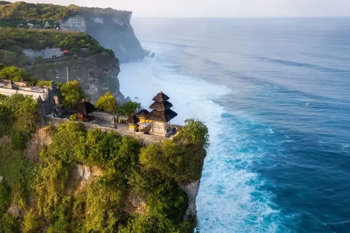 Clifftop temple above a deep blue sea on Bali’s Bukit Peninsula